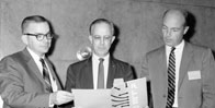  Bob Matzinger, Martin-Marietta, chairman of the IPC-A-600 committee, with Ken Varker, IBM (left) and Bob Swiggett, Photocircuits (right.)