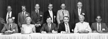 Seated: Fred Murphy, Unisys; Susan Mansilla, Robison Labs; Leo Lambert, Digital Equipment; Roger Jones, ATandT; Les Hymes, General Electric; and Ray Prasad, Intel. Standing: Werner Engelmaier, AT&T; Steve Hinch, Hewlett Packard; Tom Burke, Venture Strategies; John Endee, departing IPC President; Walt Cavender, Quality Circuits; and Paul McNamara, Aeroscientific, received the 1988 President's Award.