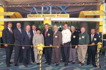 Ribbon cutting at the first APEX. From left to right: Bob Balog and Steve DeCollibus, Speedline Technologies, Jim Donaghy, Sheldahl, Inc., Deny McGuirk, IPC, Bonnie Fena, K-Byte-Hibbing Manufacturing, Gerhard Meese, Universal Instruments, Ron Underwood, Circuit Center, Steve Hall, EKRA America, Stan Plzak, Pensar Corp., Leo Reynolds, Electronic Systems. Click on the picture for a larger image.